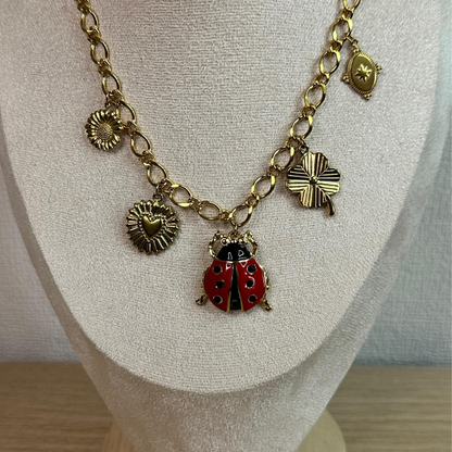 Parure con coccinella in acciaio inox